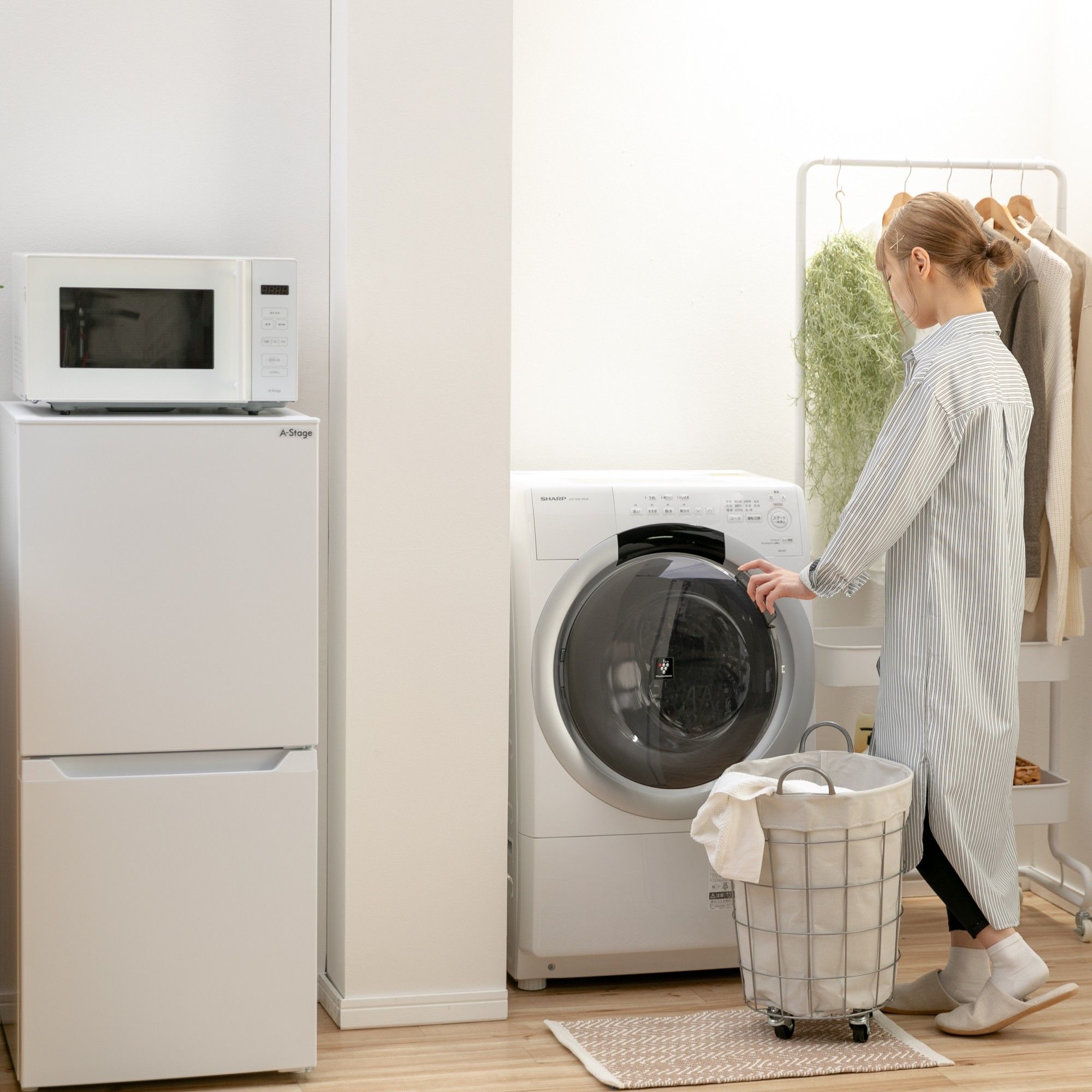 レンタル・サブスクCLASで家電セットをレンタルした女性